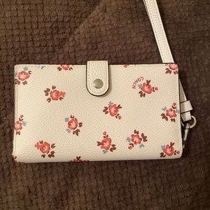 Unique and adorable Coach wristlet